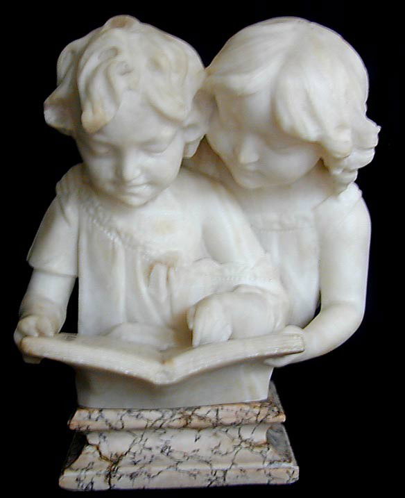 SIGNED 19THC ITALIAN MARBLE/ALABASTER SCULPTURE De: SIGNED 19THC ITALIAN MARBLE/ALABASTER SCULPTURE Depicting a charming scene of a young boy and girl reading a book, signed indistinctly on the book page, 11""H x 9""W x 7""D, designed in 2 sections-the