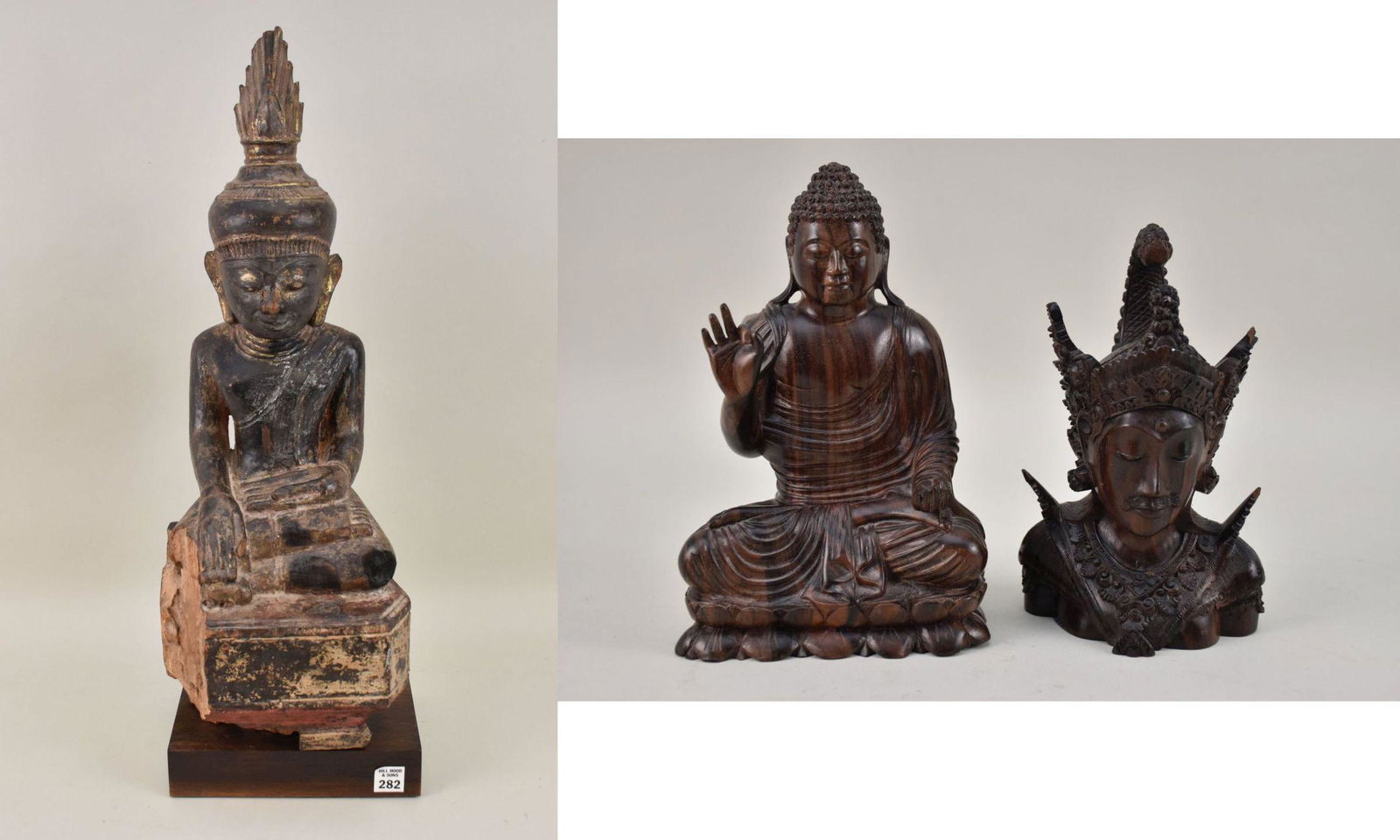 Seated Carved Buddha Figure & 2 Indonesian Buddhist Statues - A large older carved wood figure of: Seated Carved Buddha Figure & 2 Indonesian Buddhist Statues - A large older carved wood figure of the Buddha, with traces of gilt decoration, 25 3/4" . Together with two figures of carved dark wood fr