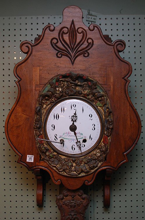 French porcelain face clock, Morbier, metal relief: French porcelain face clock, Morbier, metal relief work frame and pendulum set in a later wood case