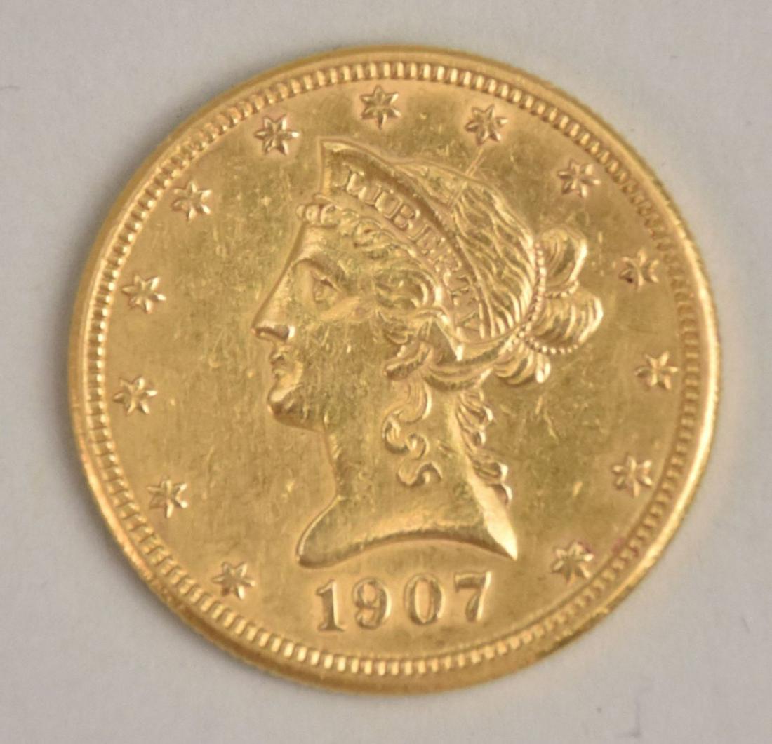 1907 Coronet Head Gold $10 Eagle Coin. Mintage: 1,203,973 Minted at: Philadelphia (No Mint Mark) (1 of 2)