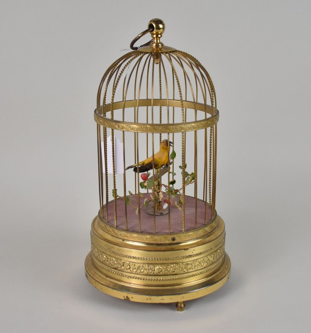 Vintage Bird Cage Automaton Music Box - Feathered yellow bird in a brass cage with foliage around (1 of 6)