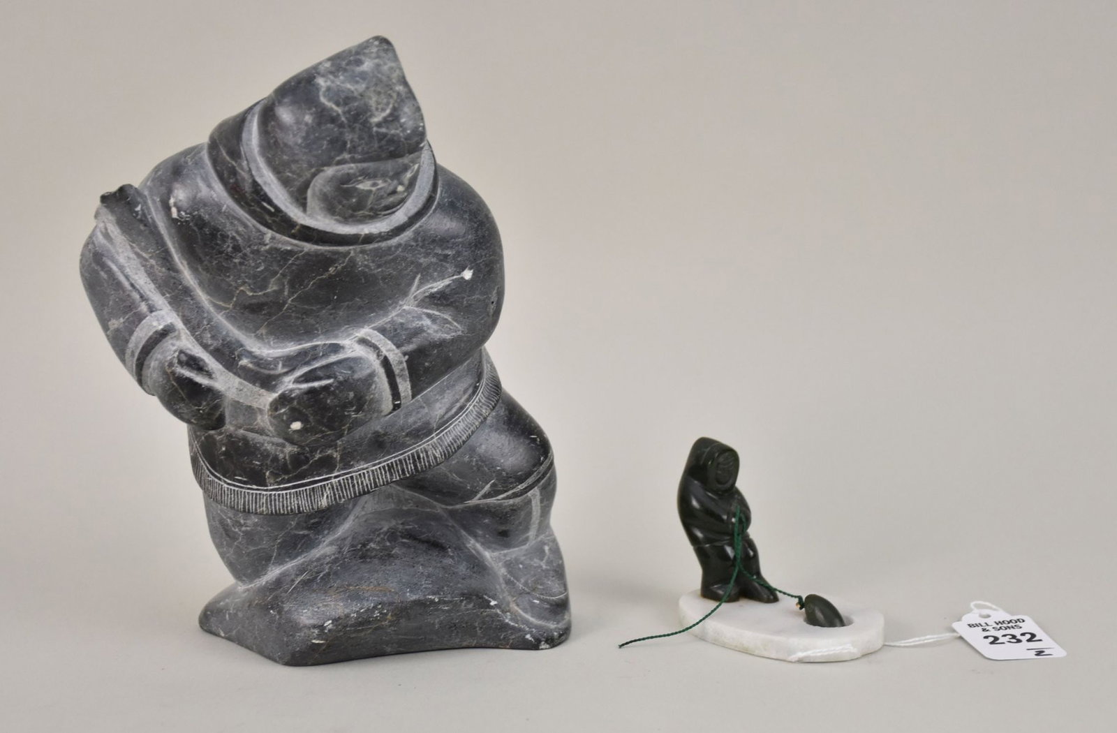 Two Canadian Eskimo Inuit Carved Figures of Soapstone & Jadeite - A) Eskimo Figure Carrying a Fish, (1 of 7)