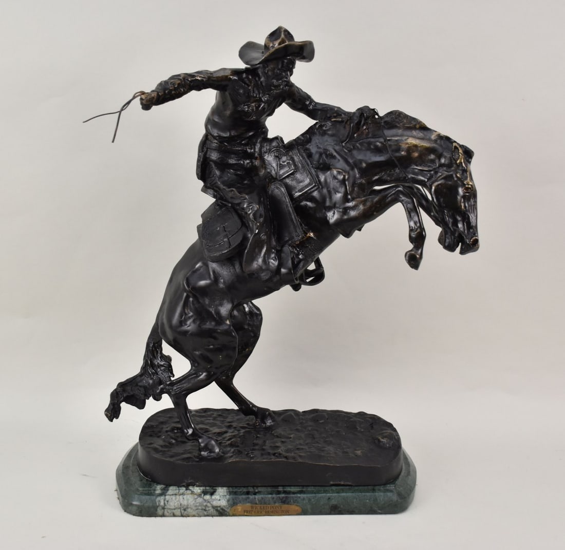 After Fredric Remington 'Bronco Buster' Bronze Sculpture - patinated bronze recast sculpture of a (1 of 7)