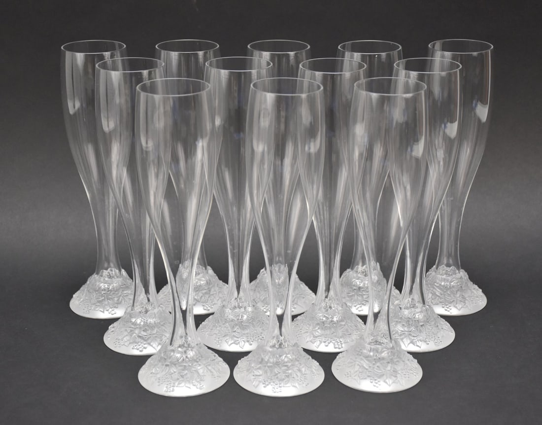 12 Lalique French Crystal Champagne Flutes, Celebration 2000, 9 1/2"h: 12 Lalique French Crystal Champagne Flutes, Celebration 2000, 9 1/2"h