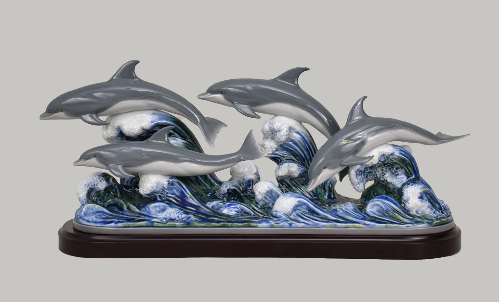 Lladro 'The Dolphins' figurine - Spain. Porcelain figurine of 4 swimming dolphins titled "The (1 of 7)
