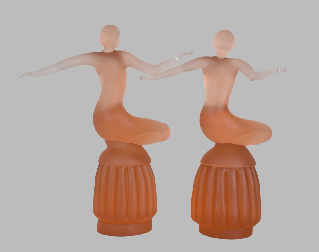Pair L. de Rai Murano Glass Nude Sculptures - Two Italian Murano glass sculptures depicting a nude: Pair L. de Rai Murano Glass Nude Sculptures - Two Italian Murano glass sculptures depicting a nude female figure posed atop a gadrooned base. Dark to very light orange glass with frosted finish. Signe