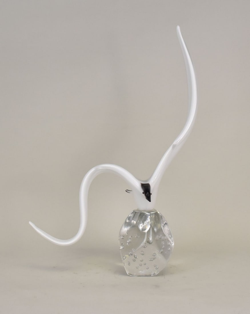 Luigi Mellara Murano Glass Flying Seagull Sculpture - Italy. 20th century. A Murano art glass: Luigi Mellara Murano Glass Flying Seagull Sculpture - Italy. 20th century. A Murano art glass sculpture of a seagull bird flying, on a clear glass base with bubbles. Signed "Mellara L." on base. 21 3/