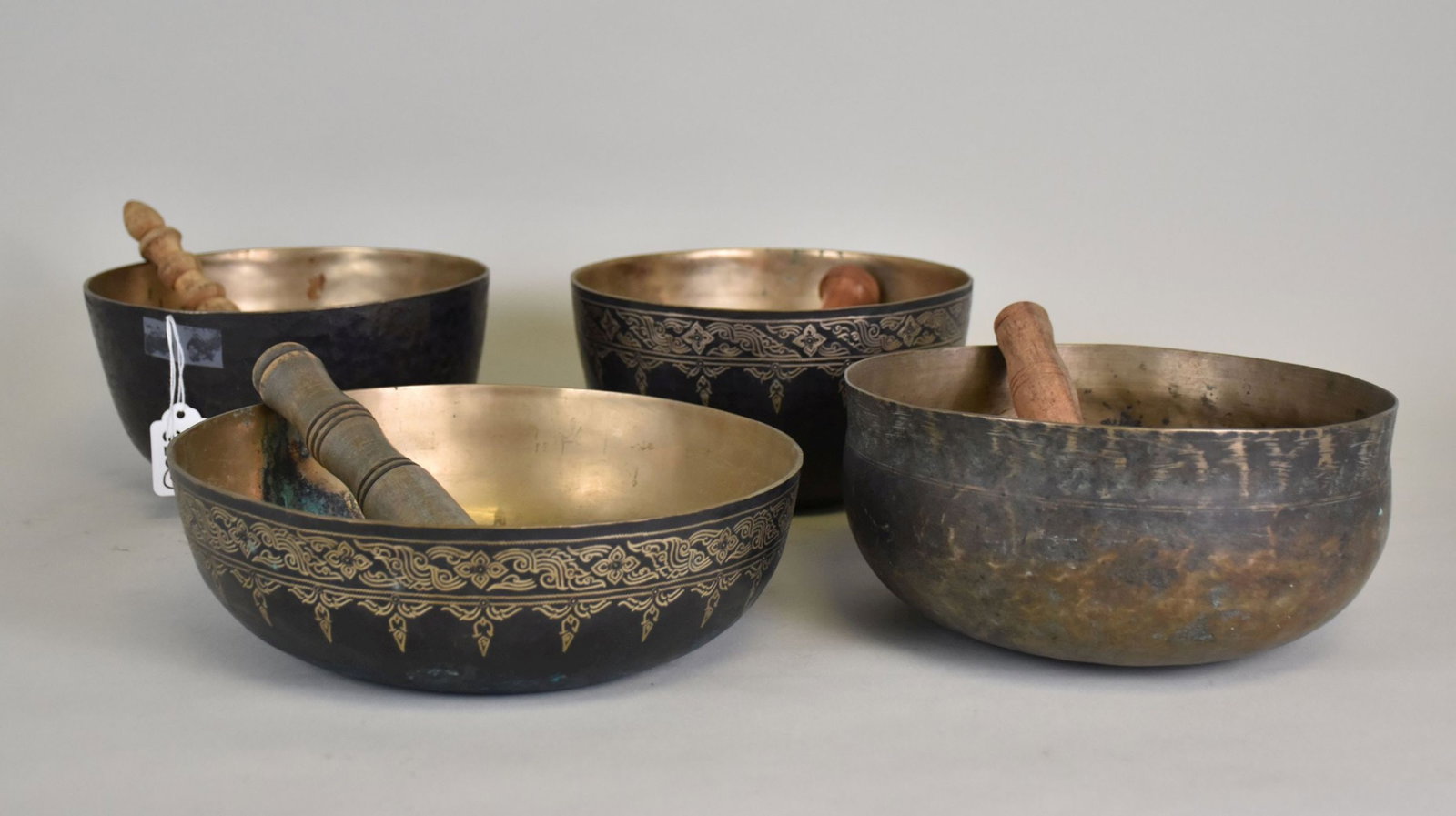 4 Handspun Bronze Bowls, 2 with Incised Gilded Design, Each with Own Musical Ring, 4 Mallets: 4 Handspun Bronze Bowls, 2 with Incised Gilded Design, Each with Own Musical Ring, 4 Mallets Included, 3" x 10" smallest, 4 12"h x 8 1/4"d largest