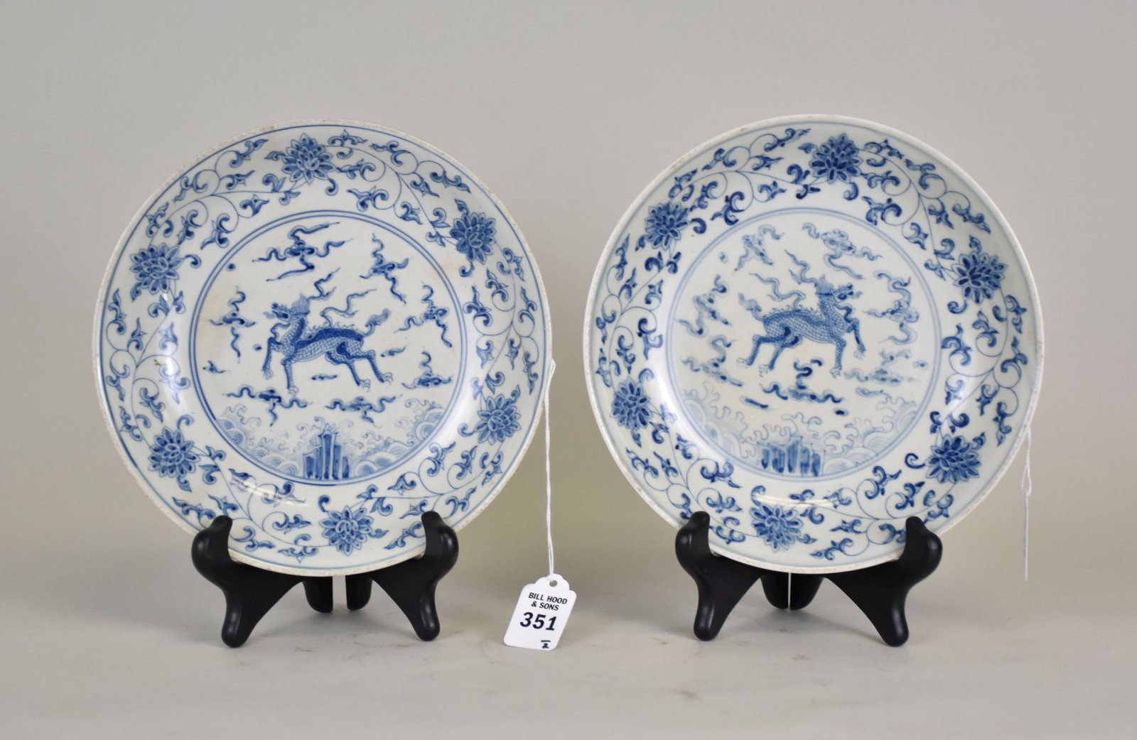 Two Chinese Blue & White Porcelain Bowls - Two Ming Dynasty-style shallow porcelain bowls with: Two Chinese Blue & White Porcelain Bowls - Two Ming Dynasty-style shallow porcelain bowls with hand-painted blue underglaze decoration featuring a central Longma dragon figure amongst clouds and waves