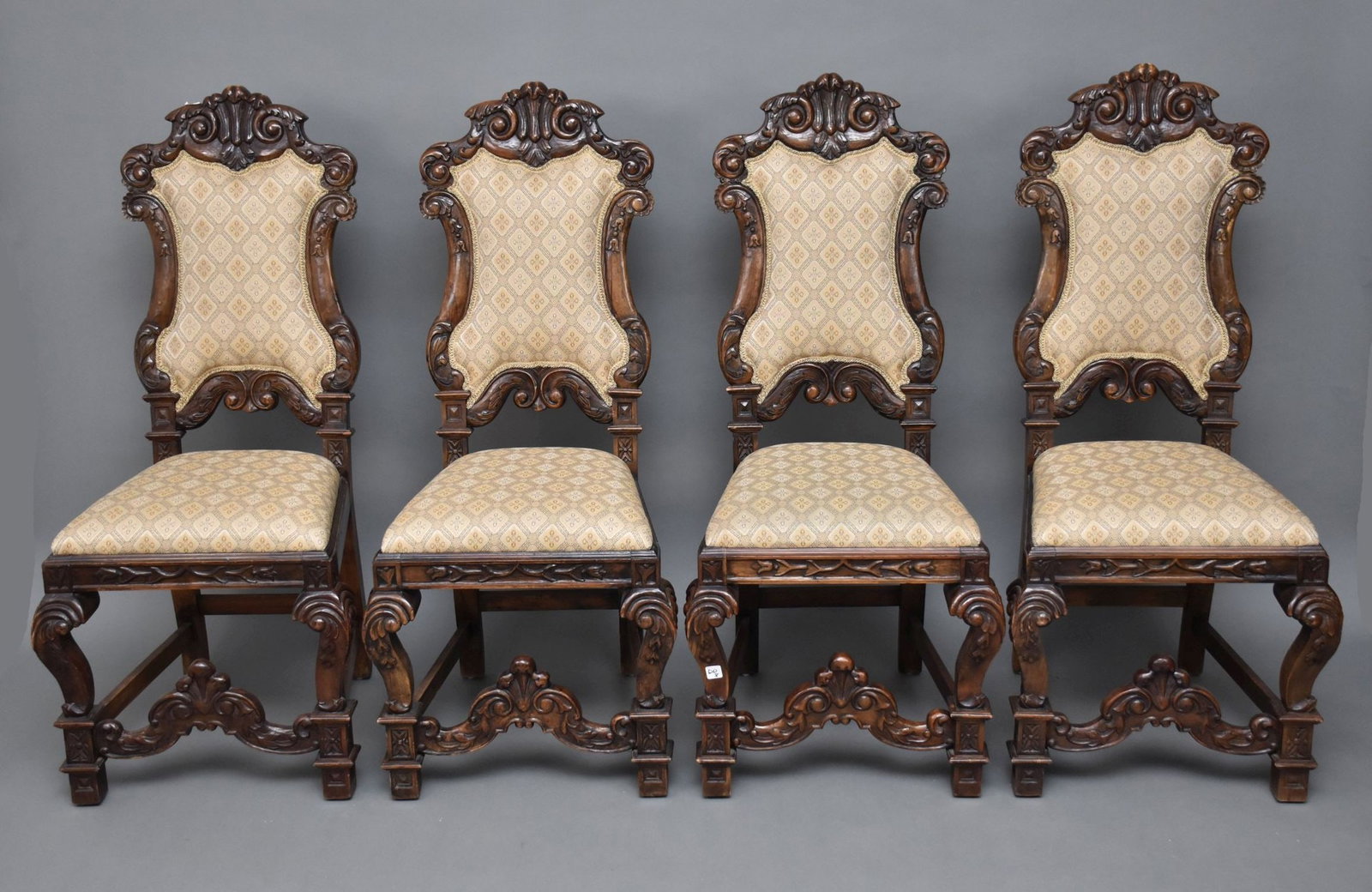 4 Heavily Carved Side Chairs with upholstered backs and seats: 4 Heavily Carved Side Chairs with upholstered backs and seats