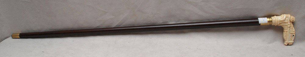 Walking stick with Marine ivory horse and jockey ha: Walking stick with Marine ivory horse and jockey handle, 37"L