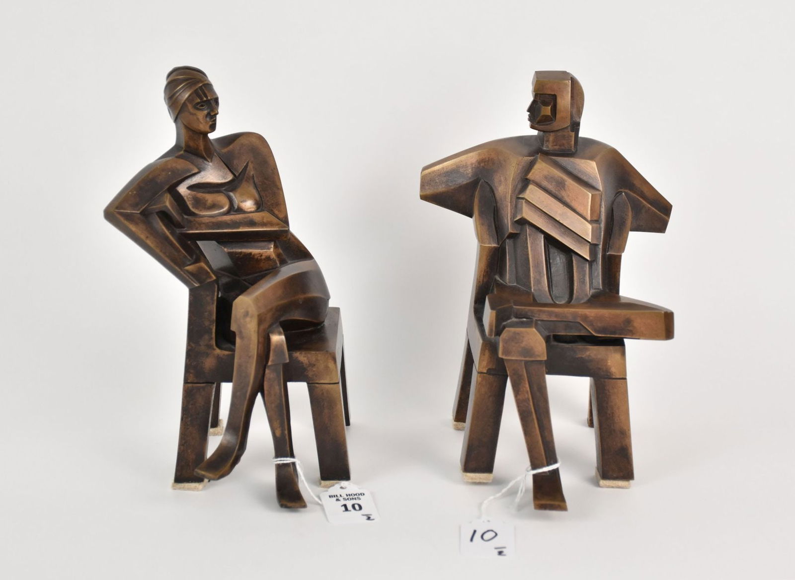 Malcolm Woodward (British, 1943-2014) Bronze Seated Man & Woman Sculptures - Two surrealist / (1 of 6)