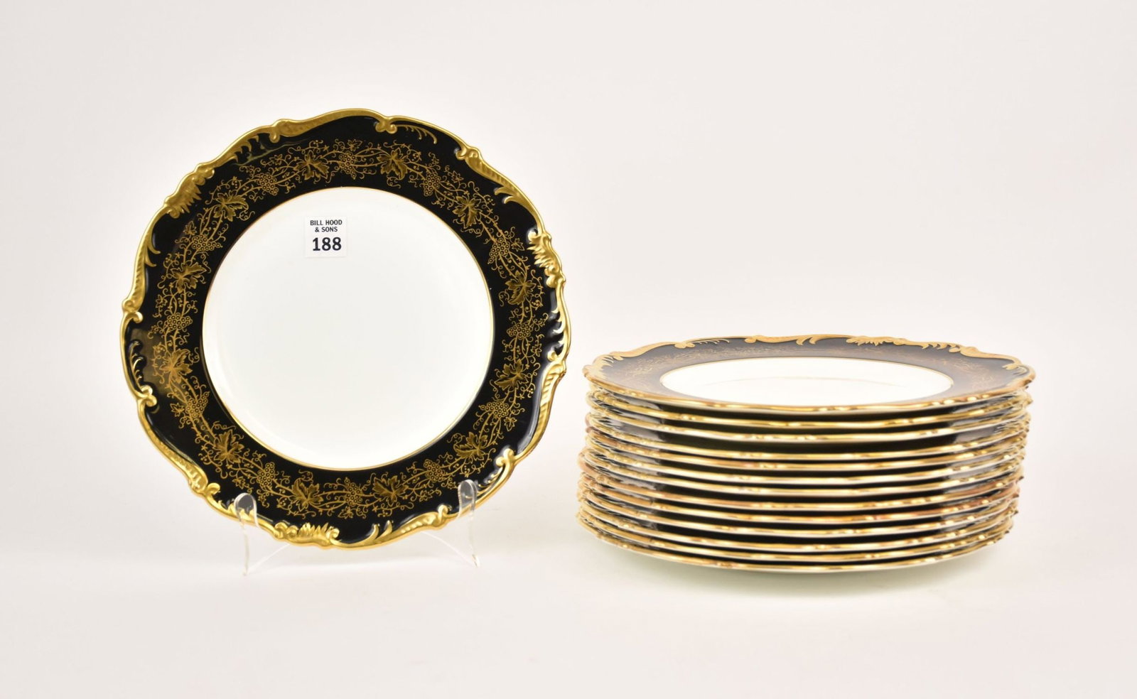 Set of 14 Coalport 'Hazelton' Plates, Black & Gilt Rim - English Coalport bone china. 10 3/4": Set of 14 Coalport 'Hazelton' Plates, Black & Gilt Rim - English Coalport bone china. 10 3/4" diameter. Green Coalport backstamp. Condition: No cracks chips or repairs.