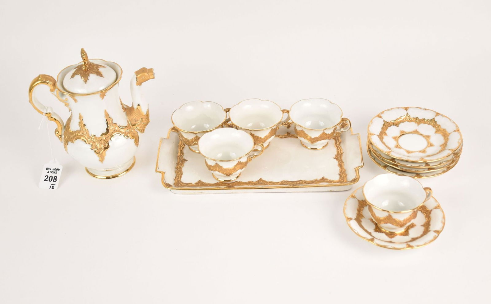 Meissen Porcelain Tea Set - White with ornate gilt scroll decoration. Set includes: Teapot 7 1/2" h, (1 of 7)