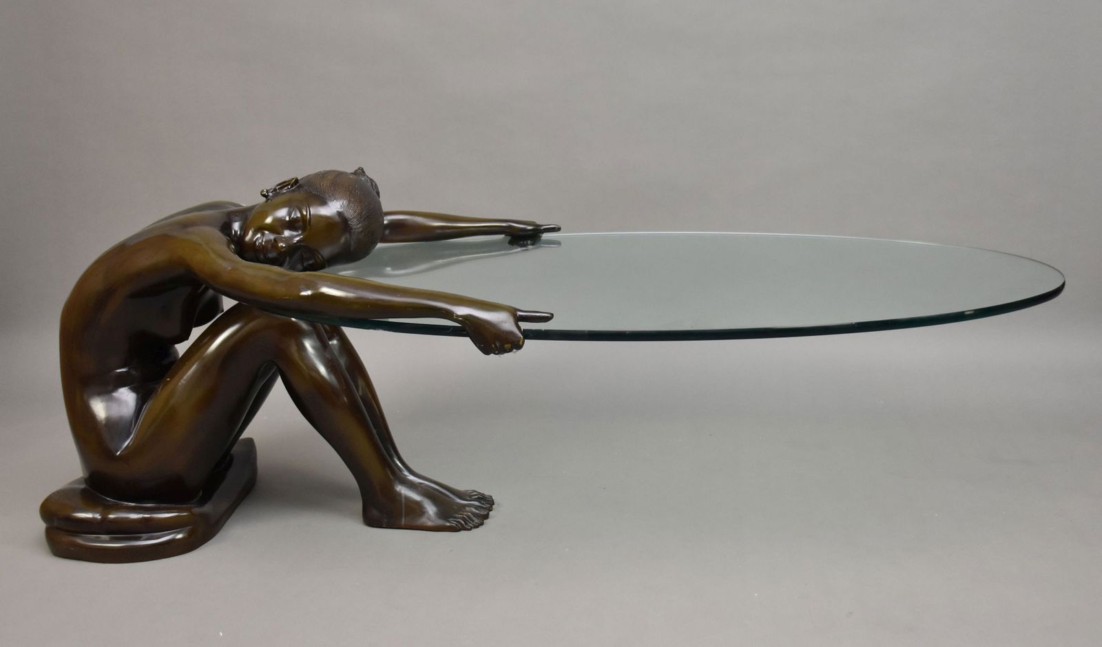 Seated Bronze Nude Female Table Support with Glass Oval Top, Bronze is 24"h, Glass Top is 52": Seated Bronze Nude Female Table Support with Glass Oval Top, Bronze is 24"h, Glass Top is 52"