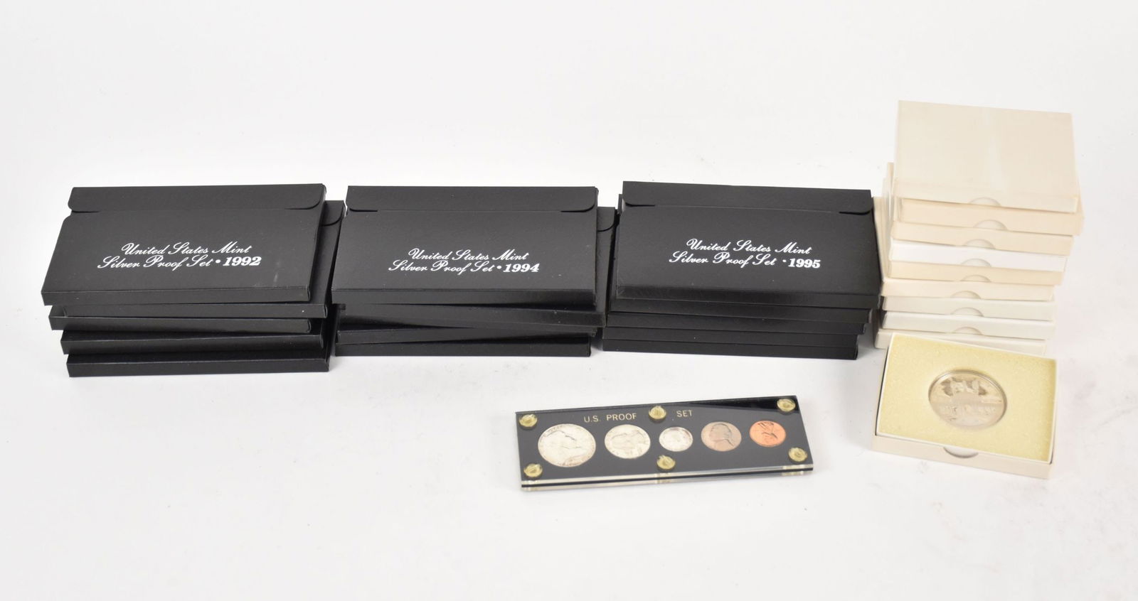 United States Mint Silver Proof Set. 5 of each 1992,1994, and 1995.  1 1956 proof set and 10 1984 (1 of 3)