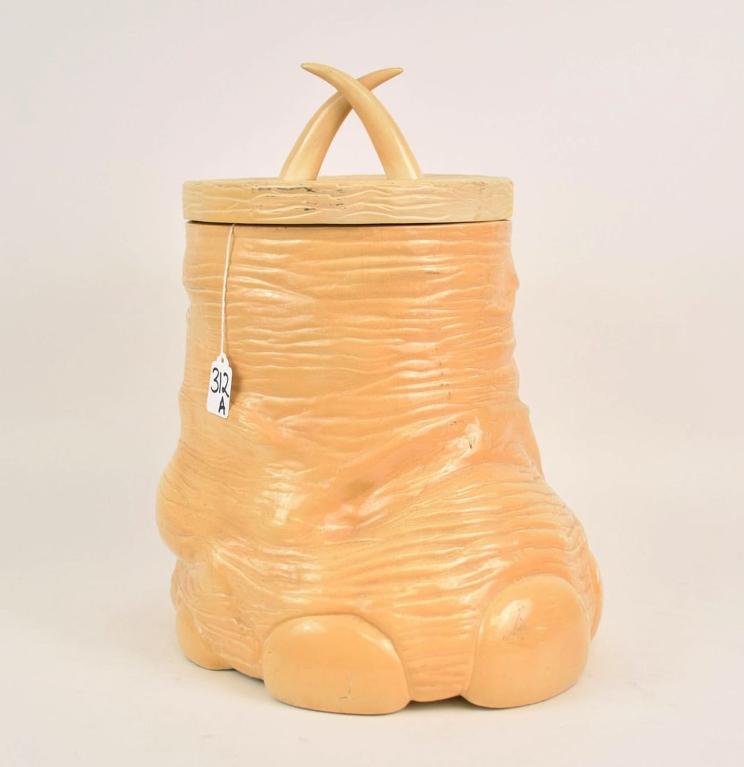 Vintage French Faux Elephant Foot Wine Cooler Wastebasket - c. 1970s. A faux elephant foot container: Vintage French Faux Elephant Foot Wine Cooler Wastebasket - c. 1970s. A faux elephant foot container with cover. Molded from a composite material and painted creamy-yellow. With a plastic liner. Used
