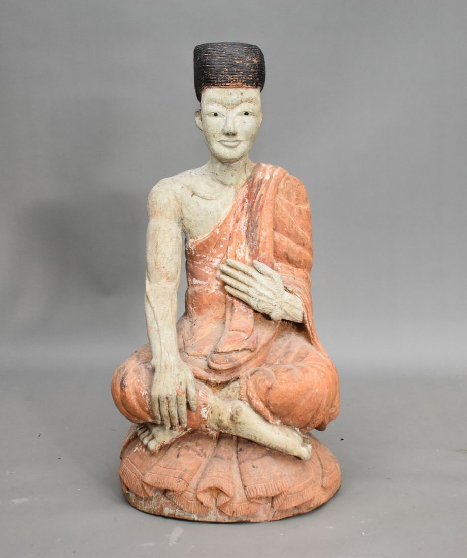 Thai Carved and Painted Wood Figure 20th Century. Seated on a carved wood domed base. Height 33: Thai Carved and Painted Wood Figure 20th Century. Seated on a carved wood domed base. Height 33”