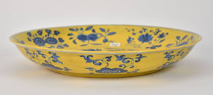 Chinese Blue Underglaze on Yellow-Ground Porcelain Charger, Xuande Mark - a large porcelain charger: Chinese Blue Underglaze on Yellow-Ground Porcelain Charger, Xuande Mark - a large porcelain charger bowl with underglaze blue decoration on a yellow glazed ground. The bowl features a central depictio