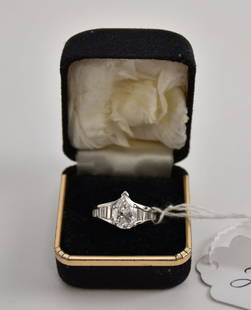 1960s' Beautiful Ladies 14K White Gold Diamond Engagement Ring. 1.95 pear Shape Diamond 1.95 cts: 1960s' Beautiful Ladies 14K White Gold Diamond Engagement Ring. 1.95 pear Shape Diamond 1.95 cts VS1 E with 14 baguette diamonds 7 on each side approx total wt 1ct VS2 G. Size 6.25 wt. 8.5 grams, appr