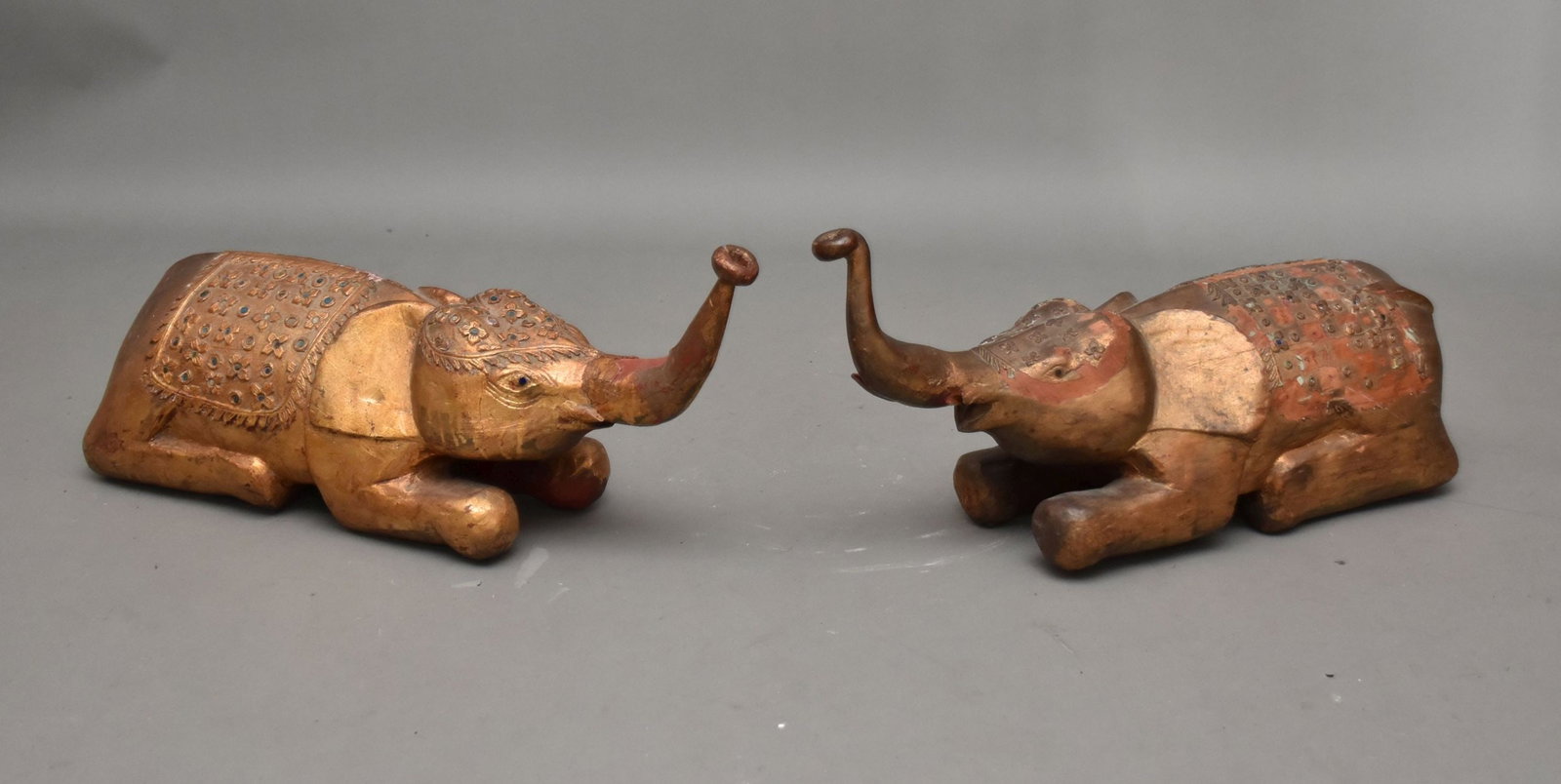 Pair Thai Reclining Elephants with Mirrored Glass Accents, 12"h x 25"w x 8"d: Pair Thai Reclining Elephants with Mirrored Glass Accents, 12"h x 25"w x 8"d