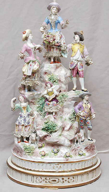 German Meissen style large porcelain lamp with grou: German Meissen style large porcelain lamp with grouping of 6 figures on cliffside, 40"h, (does have cross sword marks?)