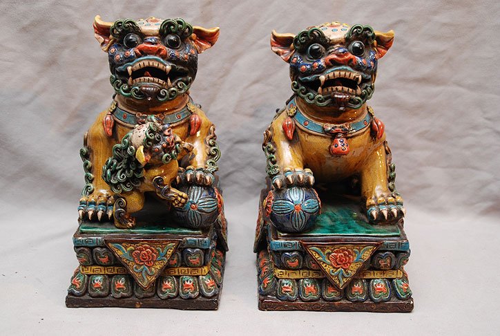 Pair Chinese pottery foo dogs, multi color, 20th : Pair Chinese pottery foo dogs, multi color, 20th c, 11 1/2"h x 11 1/2"w