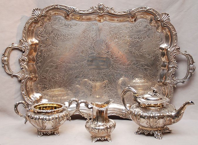 Antique English Silver 3piece repousse sterling: 19th Century English hallmark three piece repousse sterling tea service,1830-1840,London, makers mark "FD" incl: teapot, creamer and open sugar/waste bowl sold with Silverplated Tray, (the 3 pieces of