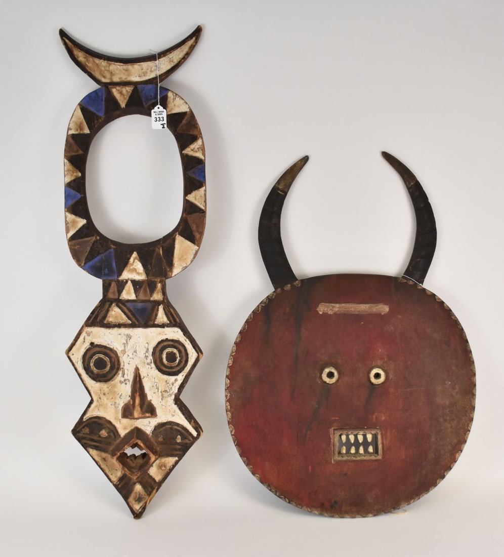 Two Vintage Carved Wood West African Tribal Masks - Two carved wood masks with pigment. Comprising: (1 of 14)