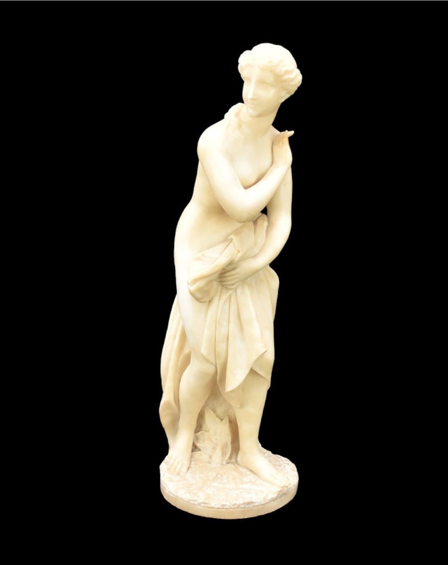 Alabaster Figural Sculpture of Diana - c. 19th Century. A carved alabaster sculpture of a female: Alabaster Figural Sculpture of Diana - c. 19th Century. A carved alabaster sculpture of a female nude representing Diana, Goddess of the Hunt. She holding a drape around her with quiver and bow at bac