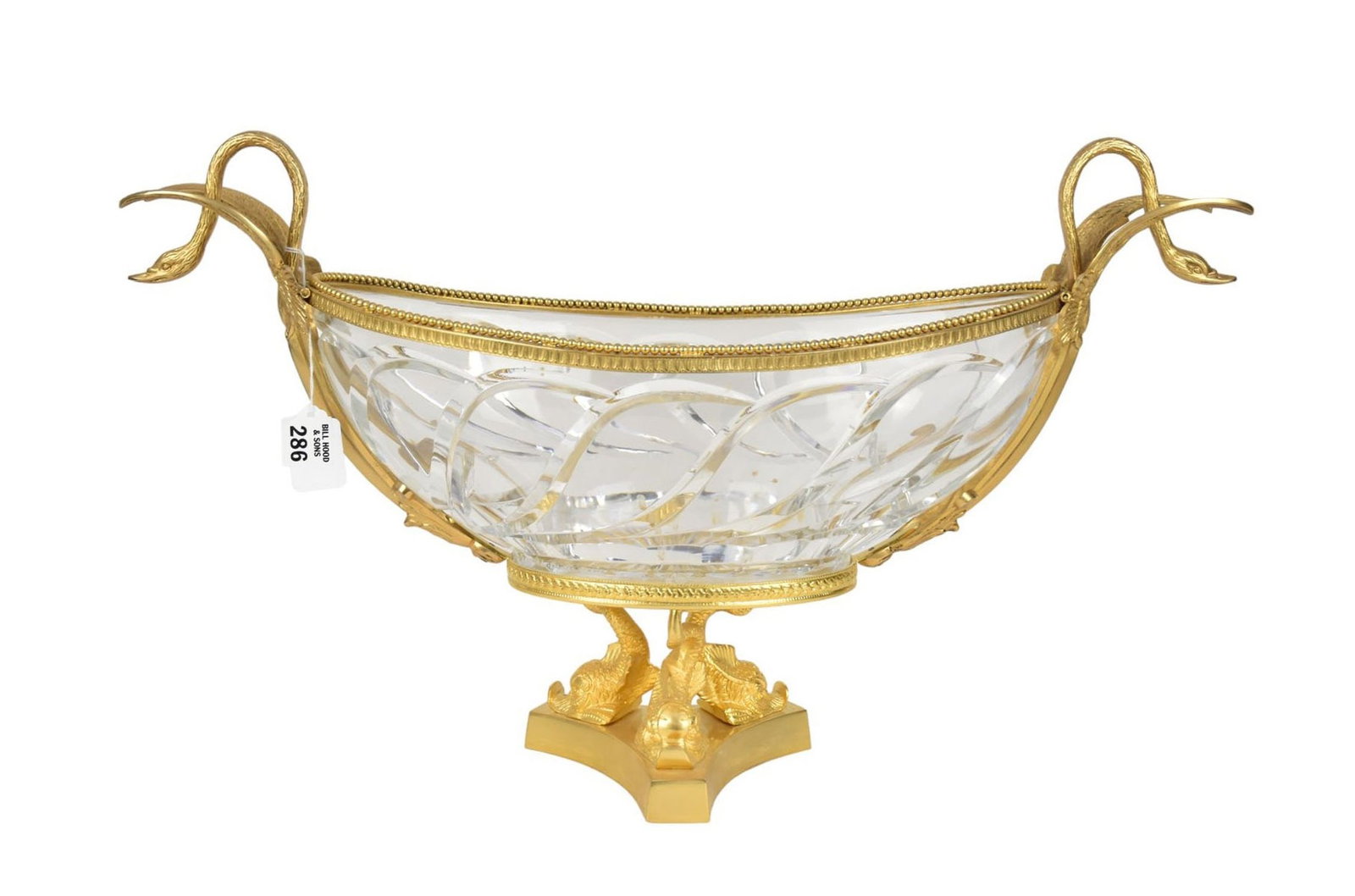 Crystal and Gilt Metal Oval Center Bowl, 20th Century, With caryatid bronze style handles, with a: Crystal and Gilt Metal Oval Center Bowl, 20th Century, With caryatid bronze style handles, with a dolphin support and having a base marked “Faberge”, H. 13” x W. 14”