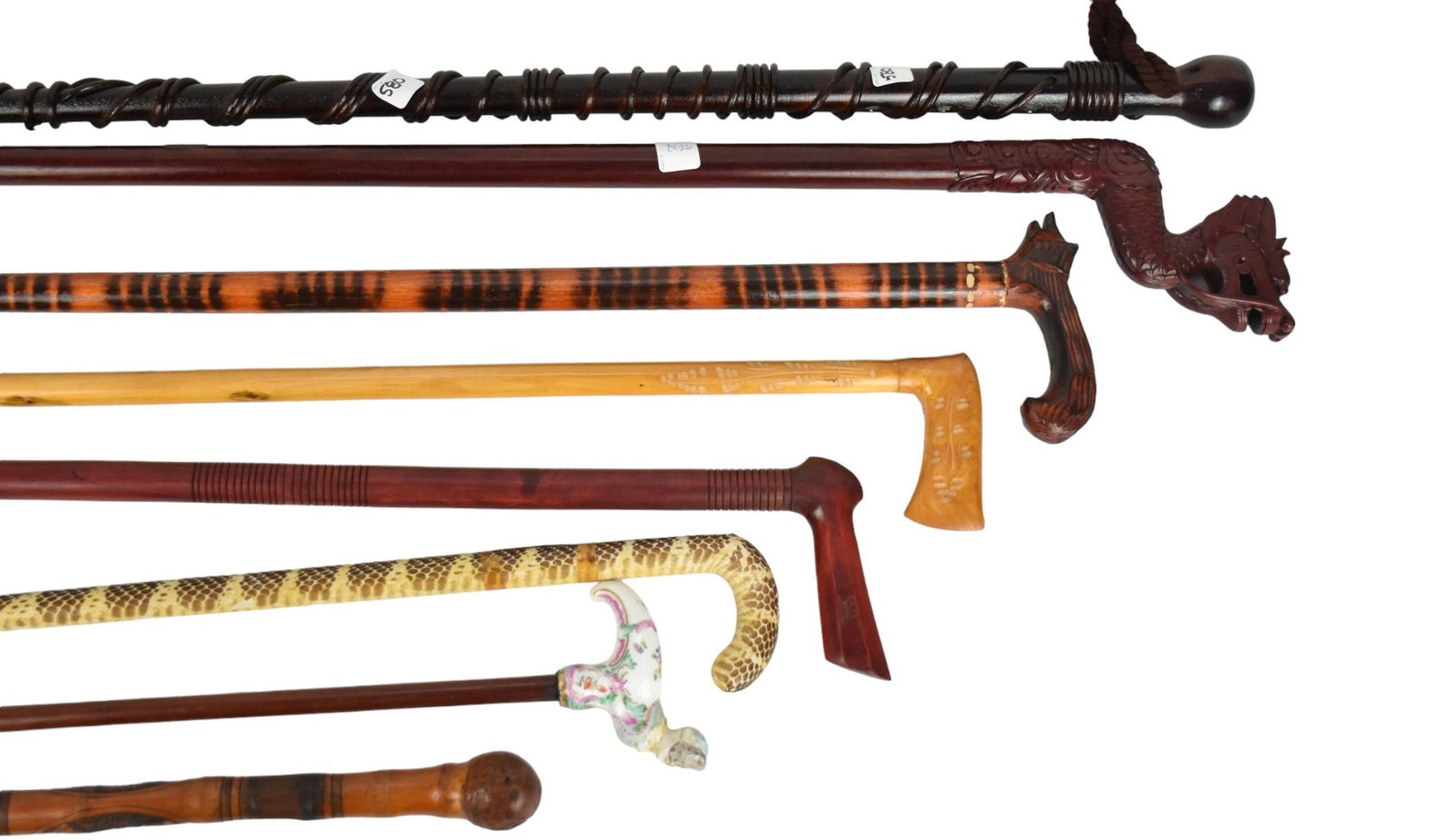 Lot of Assorted Canes, Carved, Plain and Skin: Lot of Assorted Canes, Carved, Plain and Skin