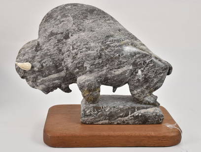 THOMAS RED BEAR (Oglala Lakota) Alabaster Sculpture of a Buffalo - A carved gray and white alabaster: THOMAS RED BEAR (Oglala Lakota) Alabaster Sculpture of a Buffalo - A carved gray and white alabaster sculpture of a buffalo/bison. With polished horn detail. Signed "Red Bear 98" on base for American