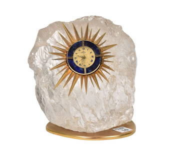 Mid-Century Sunburst Rock Crystal Clock Sculpture - A rock crystal clock sculpture. A large rock: Mid-Century Sunburst Rock Crystal Clock Sculpture - A rock crystal clock sculpture. A large rock crystal chunk set with a vintage Uti Swiza lapis lazuli clock, surrounded by a gilt brass sunburst and