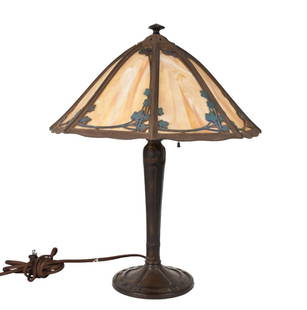 Antique Slag Glass Lamp - An antique table lamp with amber-colored slag glass, leaf & vine overlay.: Antique Slag Glass Lamp - An antique table lamp with amber-colored slag glass, leaf & vine overlay. With a bronze finish cast iron lamp base. Two-light fixture. 21 1/4" h, shade diameter 17". Conditio