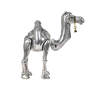 Frank Meisler (Israel, 1929-2018) Articulated Camel Sculpture - A silvered metal standing camel: Frank Meisler (Israel, 1929-2018) Articulated Camel Sculpture - A silvered metal standing camel sculpture by Israeli sculptor Frank Meisler. The head and neck of camel articulated, gilt accents to eye