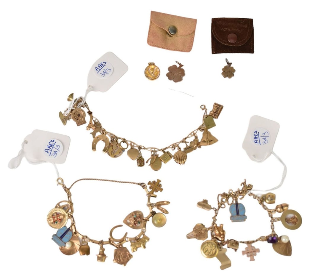 3 Charm Bracelets with Charms, Mostly 14kt gold, some 9 & 10Kt gold, 3 Loose Charms 9kt gold, 92: 3 Charm Bracelets with Charms, Mostly 14kt gold, some 9 & 10Kt gold, 3 Loose Charms 9kt gold, 92 Total Grams