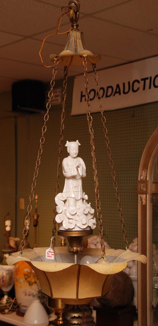 Chandelier with tole shade and blanc de chine Quan: Chandelier with tole shade and blanc de chine Quan Yin figure in center, 22"h