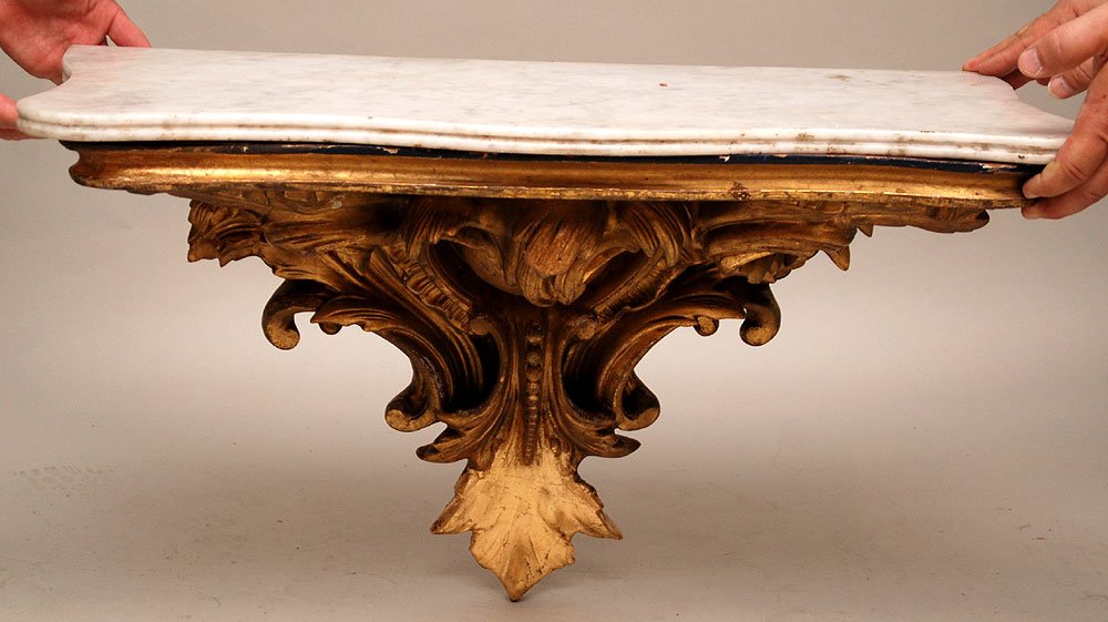 Gilt wood rococo hanging wall shelf with marble su: Gilt wood rococo hanging wall shelf with marble surface, 18"h x 27"w