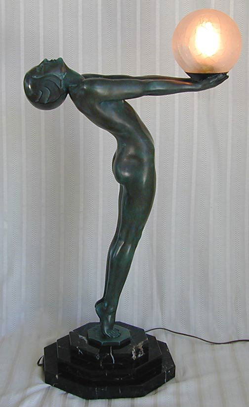 MAX LE VERRIER (FRENCH 1891-1973) DECO BRONZE LAMP: MAX LE VERRIER (FRENCH 1891-1973) DECO BRONZE LAMP A large and impressive Art Deco Bronze & glass lamp by the French sculptor Max Le Verrier, sculpted as a sinuous nude female figure holding a large a