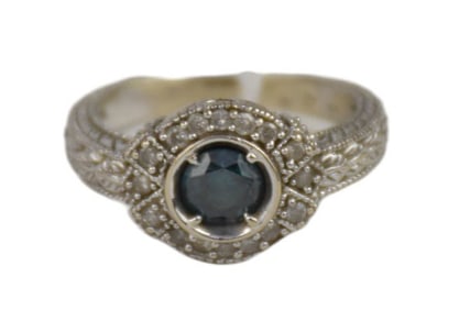 14K White Gold Blue Diamond Ring with Diamond Halo. Size 7 wt. 5.5 grams Center Blue Diamond 1/2
