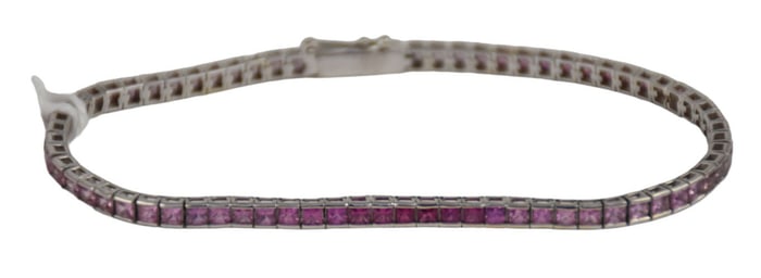 18K White Gold Pink Sapphire Tennis Bracelet. Length 6.5" Wt. 7.5 grams. Carat weight 4.58
