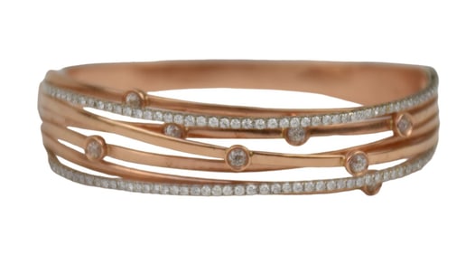 14K Yellow & White Gold Diamond Bangle. Wt 27.4 grams 6.5" inner circumference with 1.5" opening