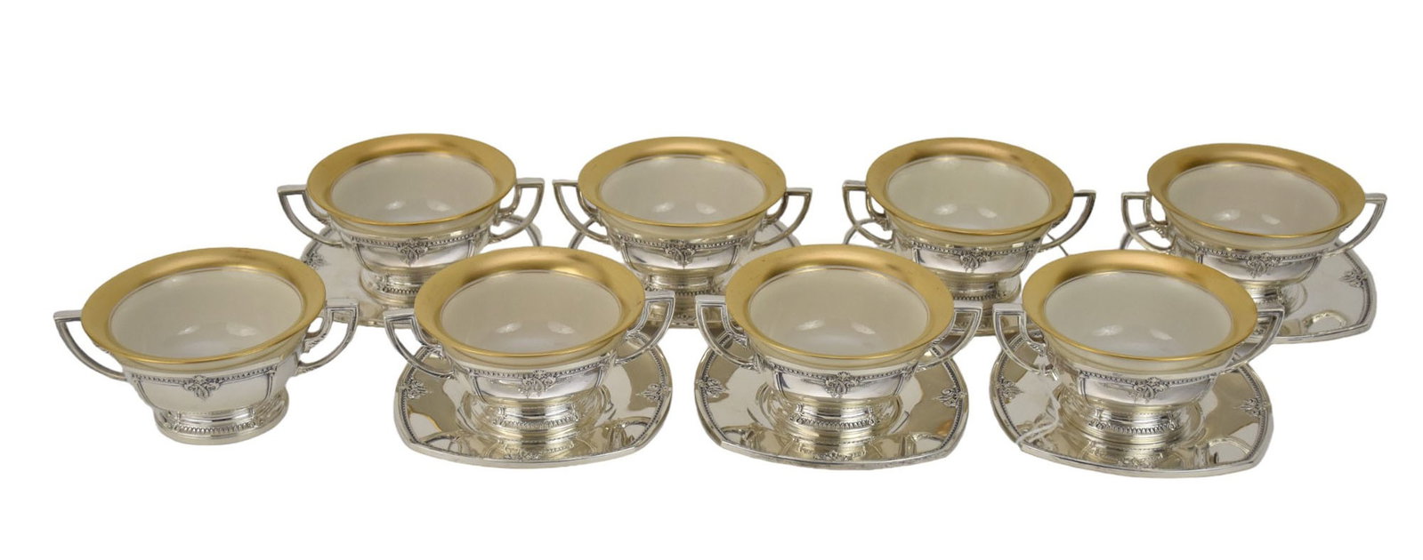 International TRIANON Sterling & Lenox Soup Bowls & Underplates - Set of 8 soup bowls and 7: International TRIANON Sterling & Lenox Soup Bowls & Underplates - Set of 8 soup bowls and 7 underplates. Trianon pattern by International Silver Co. Lenox porcelain inserts, cream with gilt rims (gree
