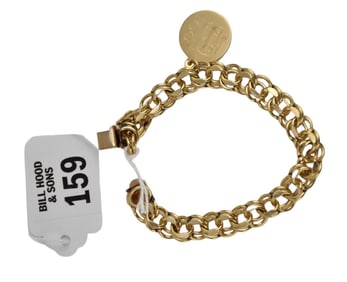 14K Yellow Gold Charm Bracelet. 7" wt. 26 grams has I charm engraved.