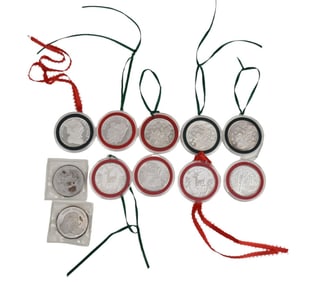 10 - 1 ozts. Silver Christmas Rounds. 1989 - 2003
