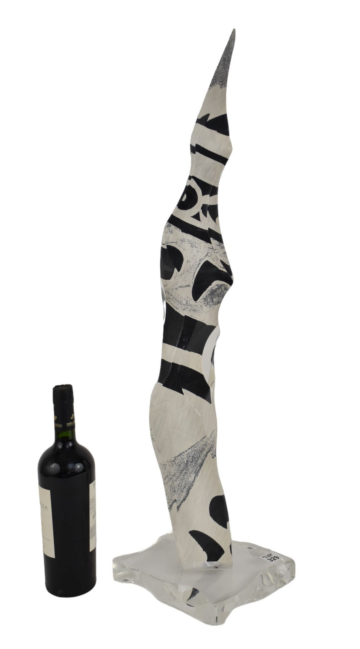 Mid-Century Modernist Lucite Sculpture, Van Teal Style - A MCM clear Lucite abstract "flame": Mid-Century Modernist Lucite Sculpture, Van Teal Style - A MCM clear Lucite abstract "flame" sculpture with black and white abstract pattern "fabric" set inside the flame. Unsigned, but in the style o