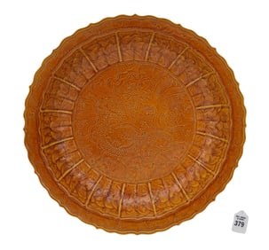 Chinese Orange Glazed Porcelain Charger with Relief Dragon Motif - A large porcelain charger bowl
