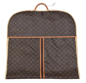 A vintage Louis Vuitton garment cover Brown and tan monogram coated canvas with brass hardware,