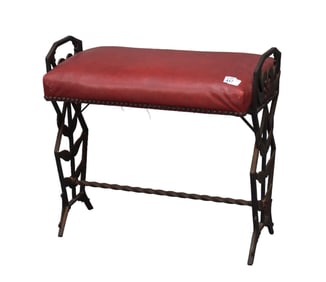 Iron bench with red leather top,  18"h x 22"w x 13"d